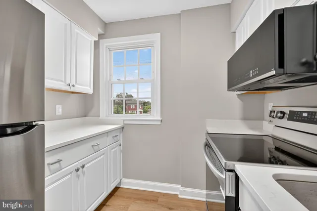 a utility room with washer and dryer