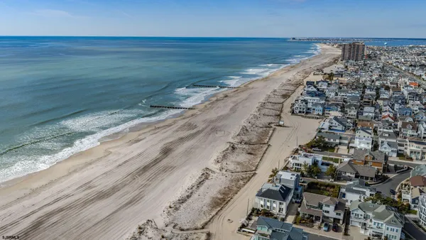 an aerial view of beach and ocean