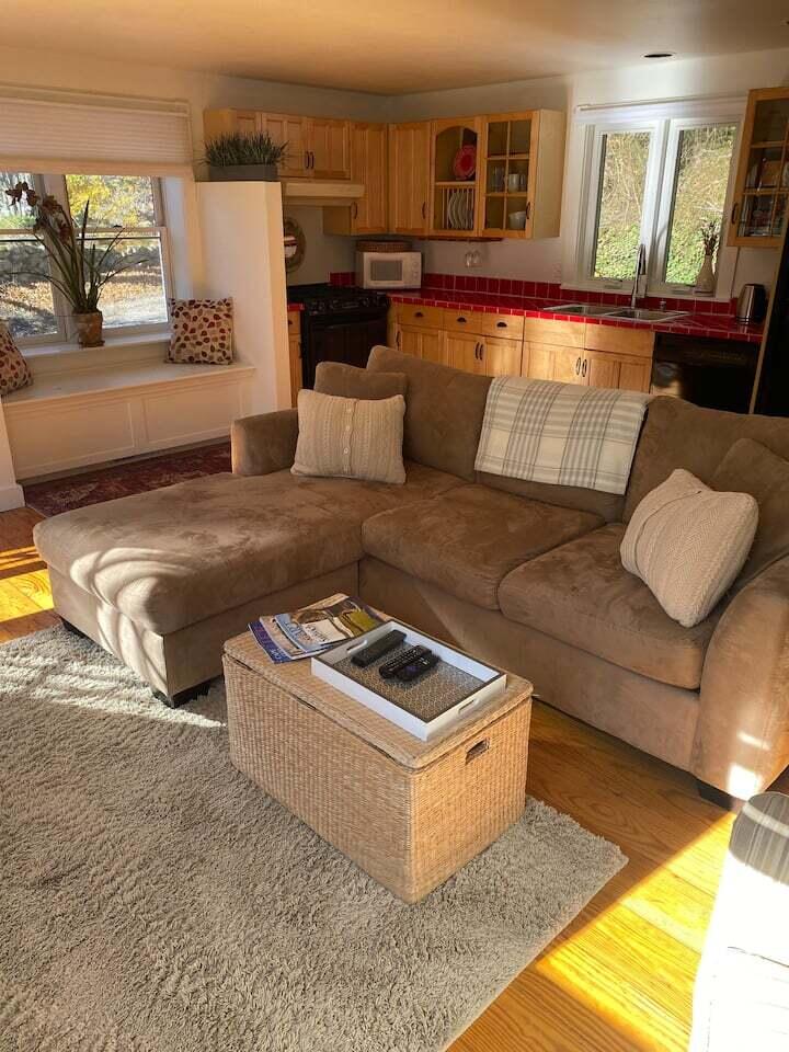 95 Main Street, Unit A Sandwich, MA 02563 - Photo 4 of 13 a living room with furniture and a couch
