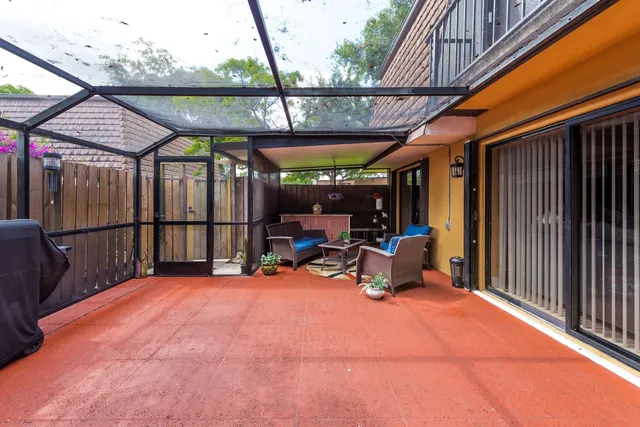 a view of sitting area in front of house