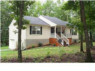 0 Gladiola Road, Unit Q25 Ruckersville, VA 22968 - Photo 1 of 4 a backyard of a house with table and chairs