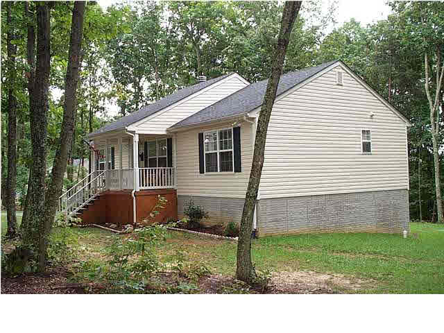 0 Gladiola Road, Unit Q25 Ruckersville, VA 22968 - Photo 3 of 4 a view of a backyard with a garden and plants