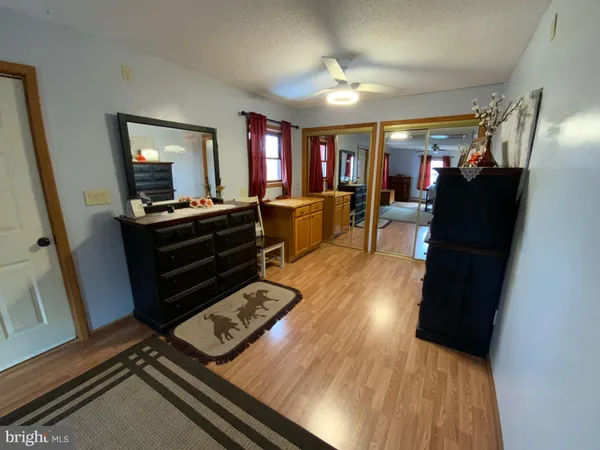 a view of a living room and dining room