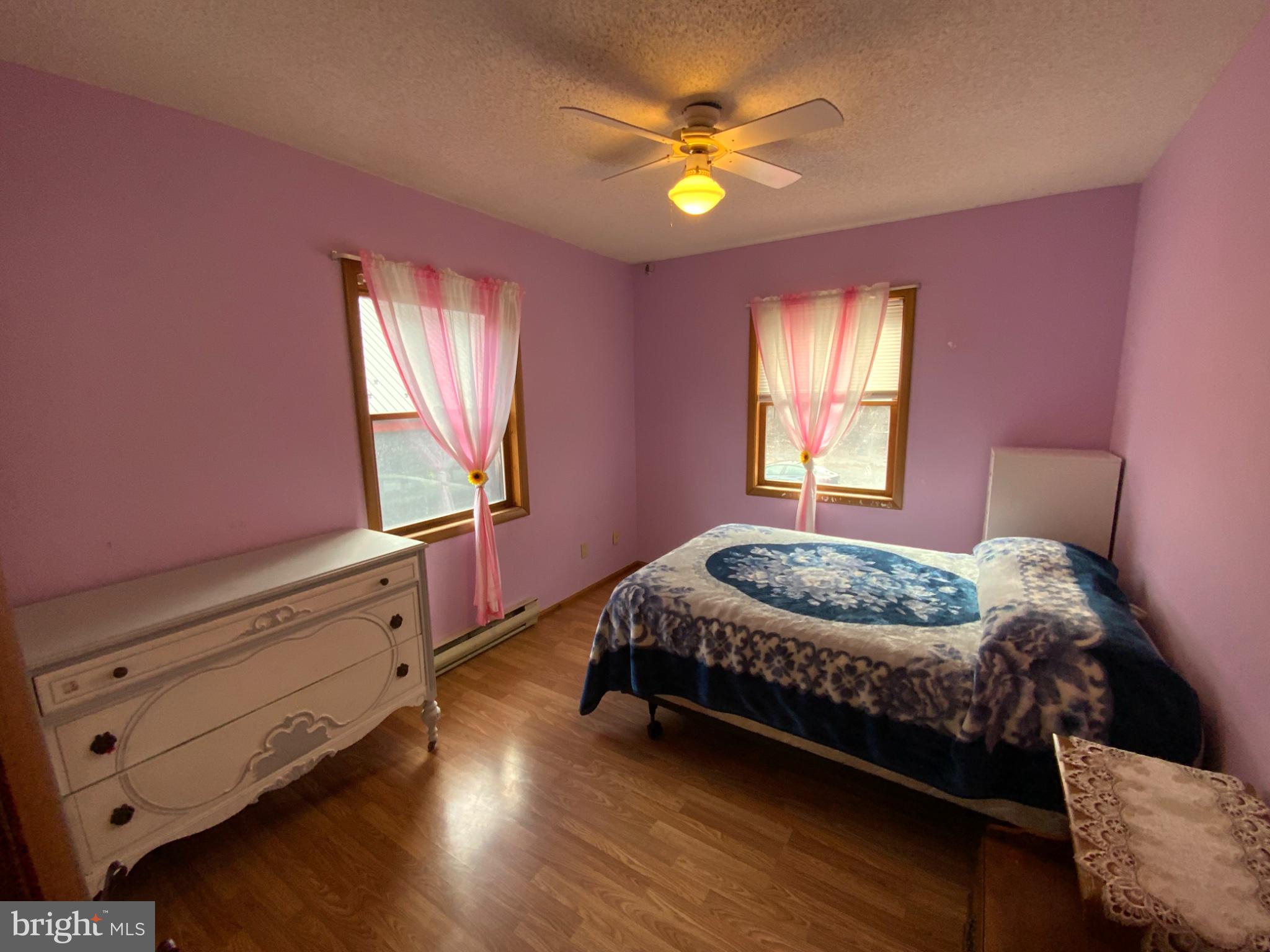 1682 Youngdale Road Lock Haven, PA 17745 - Photo 18 of 36 Charming pastel bedroom with natural light.