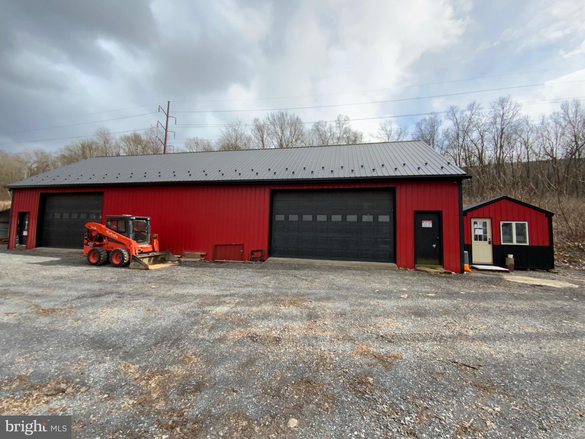 1682 Youngdale Road Lock Haven, PA 17745 - Photo 21 of 36 Vibrant red barn with spacious garage.