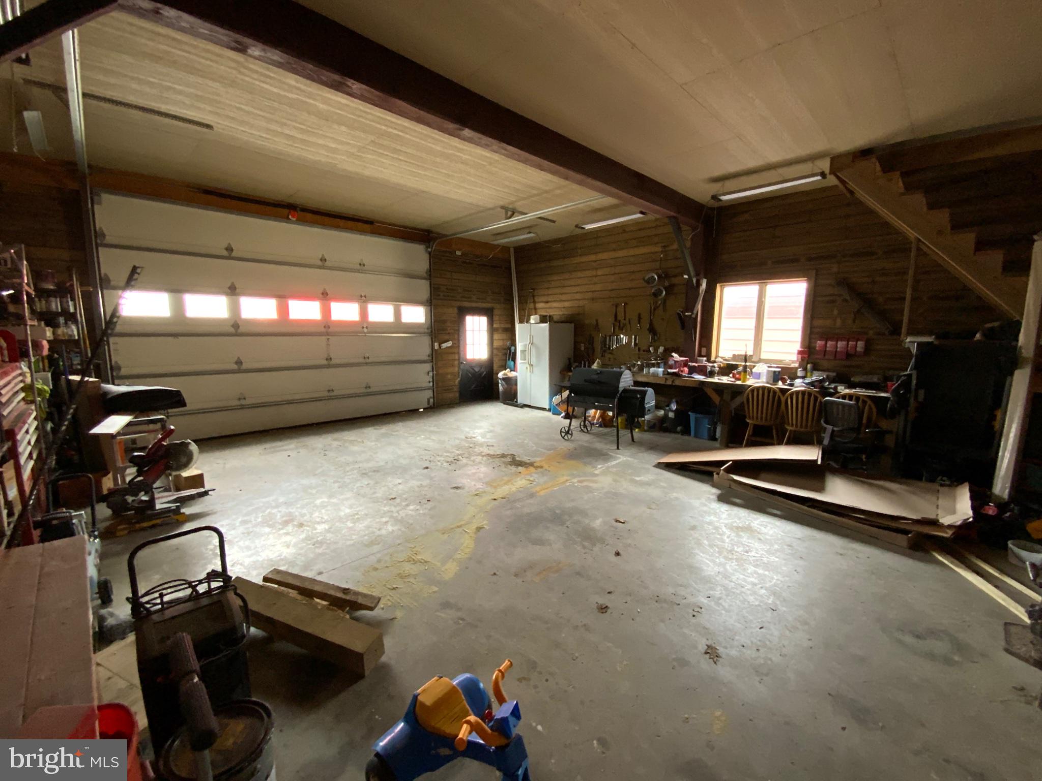 1682 Youngdale Road Lock Haven, PA 17745 - Photo 23 of 36 Spacious garage with rustic charm.