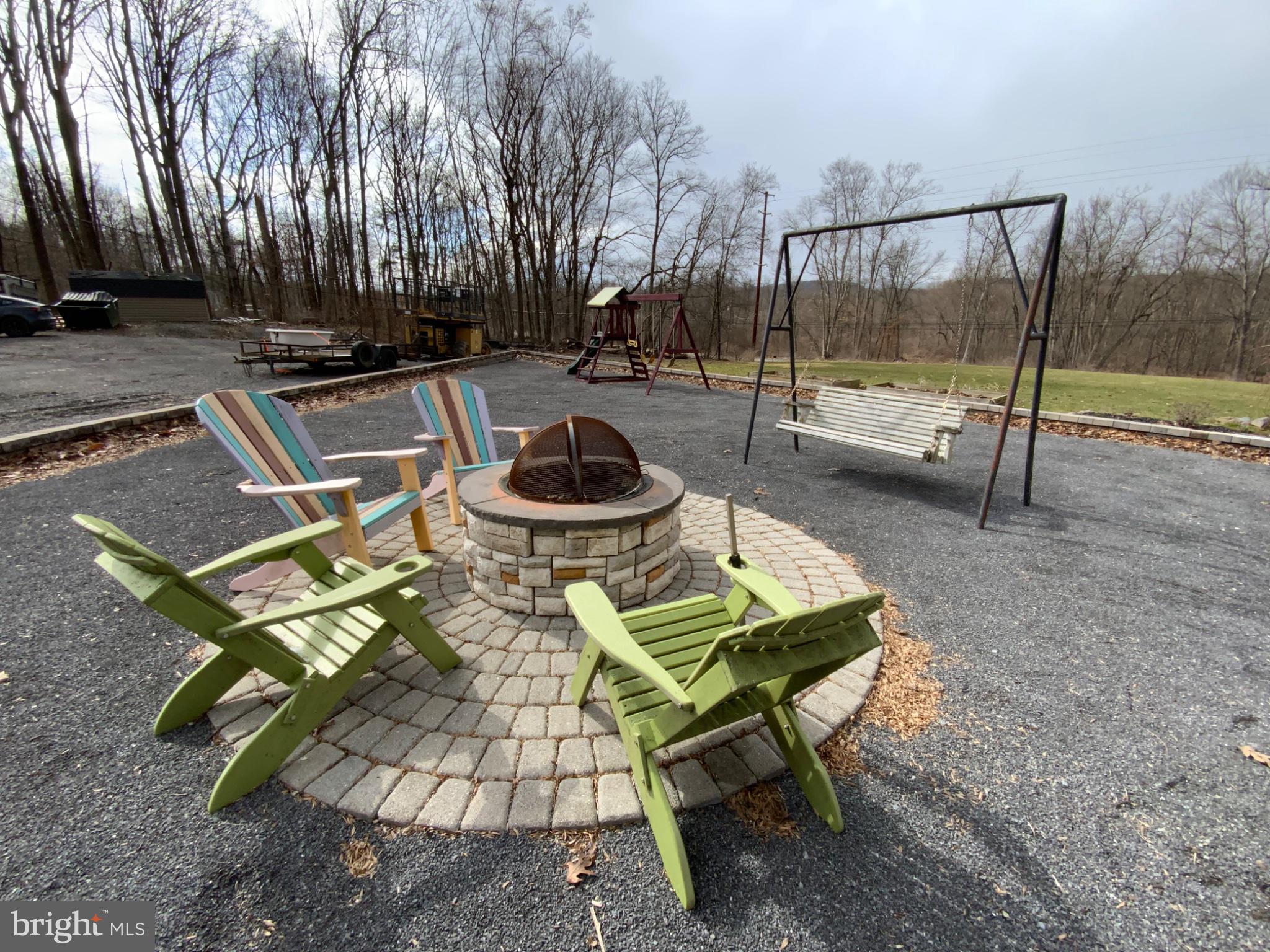 1682 Youngdale Road Lock Haven, PA 17745 - Photo 31 of 36 Cozy fire pit retreat in nature.