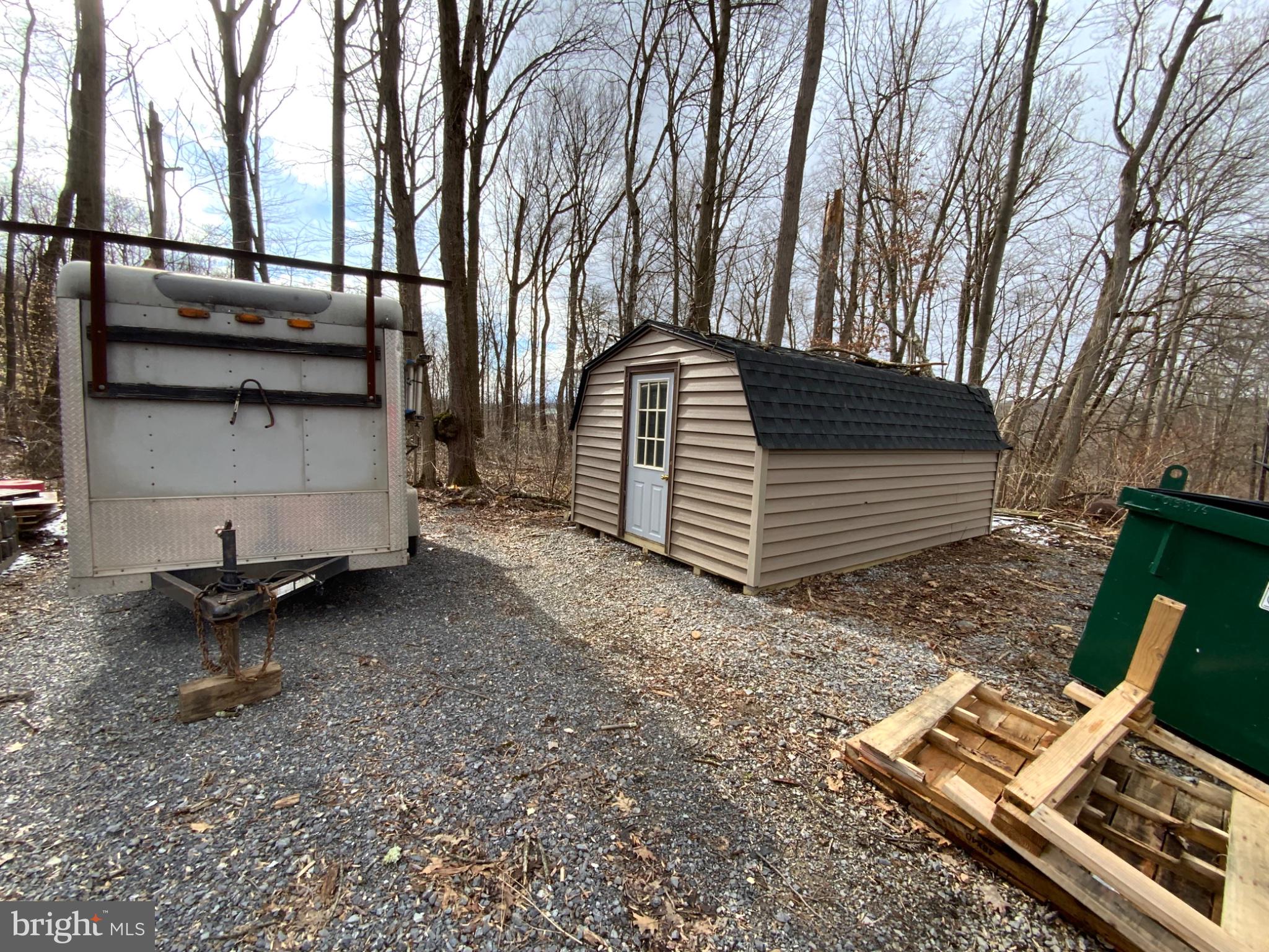 1682 Youngdale Road Lock Haven, PA 17745 - Photo 35 of 36 Charming shed nestled in the woods.