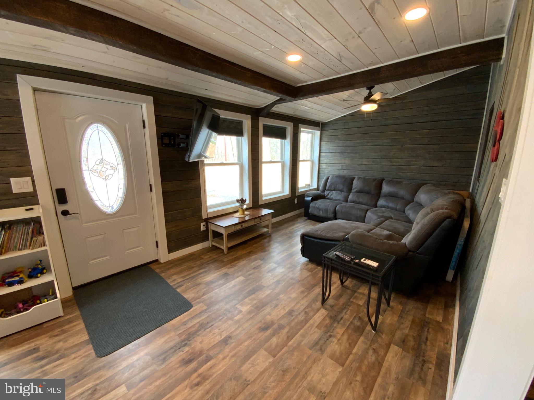 1682 Youngdale Road Lock Haven, PA 17745 - Photo 10 of 36 Cozy living space with rustic charm.