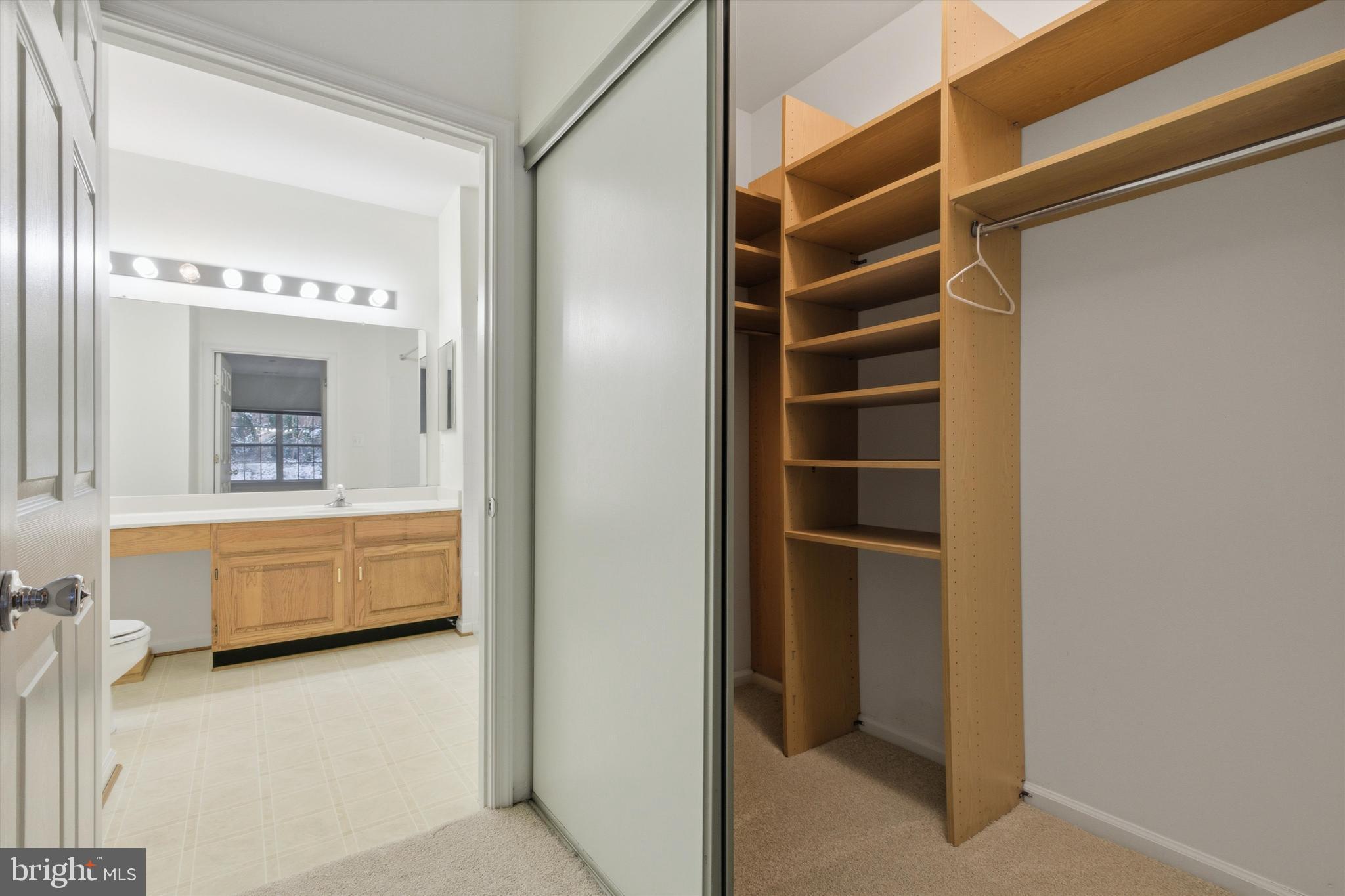 1640 Fallowfield Court, Unit 1640 Crofton, MD 21114 - Photo 14 of 27 a bathroom with a tub a mirror and shower