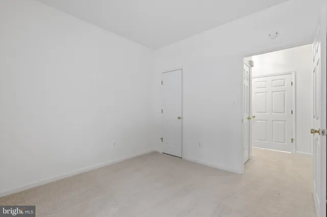 a view of street with parked cars