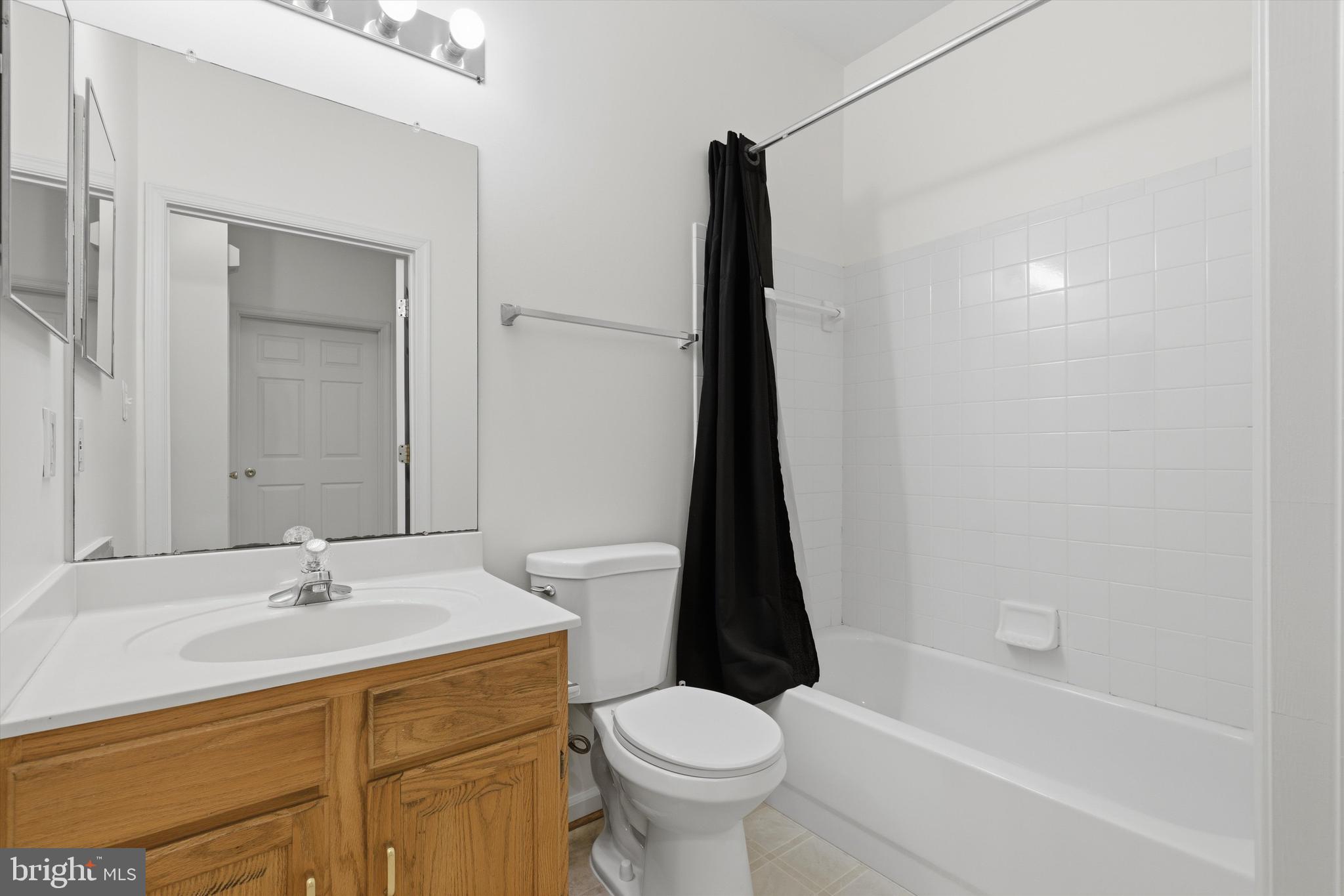 1640 Fallowfield Court, Unit 1640 Crofton, MD 21114 - Photo 18 of 27 a bathroom with a sink toilet and a bathtub