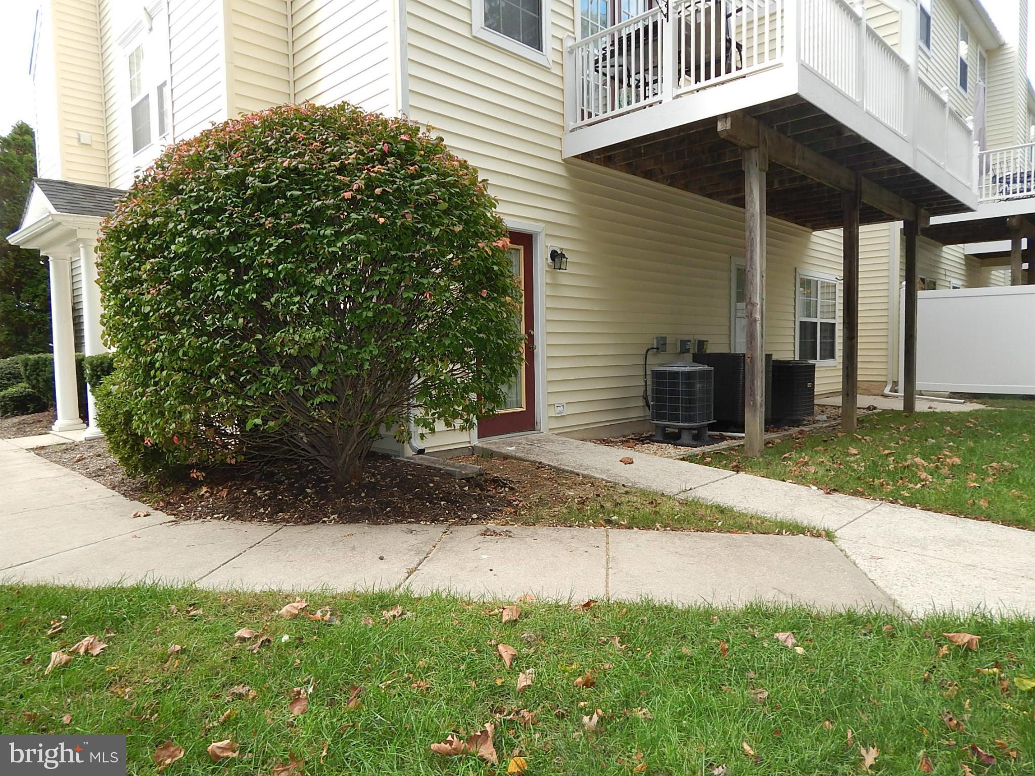 1640 Fallowfield Court, Unit 1640 Crofton, MD 21114 - Photo 20 of 27 a view of a house with a yard and plants