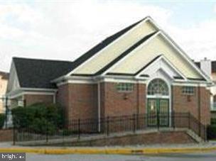 1640 Fallowfield Court, Unit 1640 Crofton, MD 21114 - Photo 23 of 27 a view of a small house with wooden fence