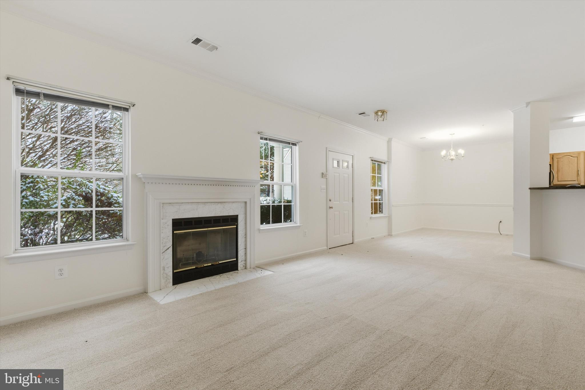 1640 Fallowfield Court, Unit 1640 Crofton, MD 21114 - Photo 6 of 27 a view of empty room with a fireplace