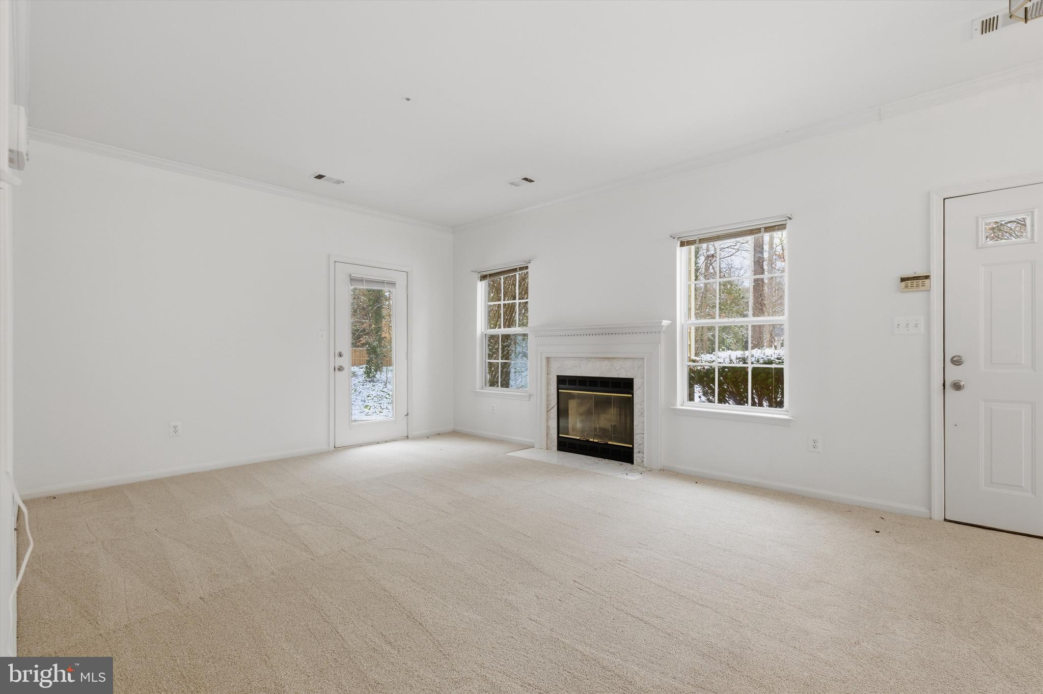 1640 Fallowfield Court, Unit 1640 Crofton, MD 21114 - Photo 9 of 27 an empty room with windows