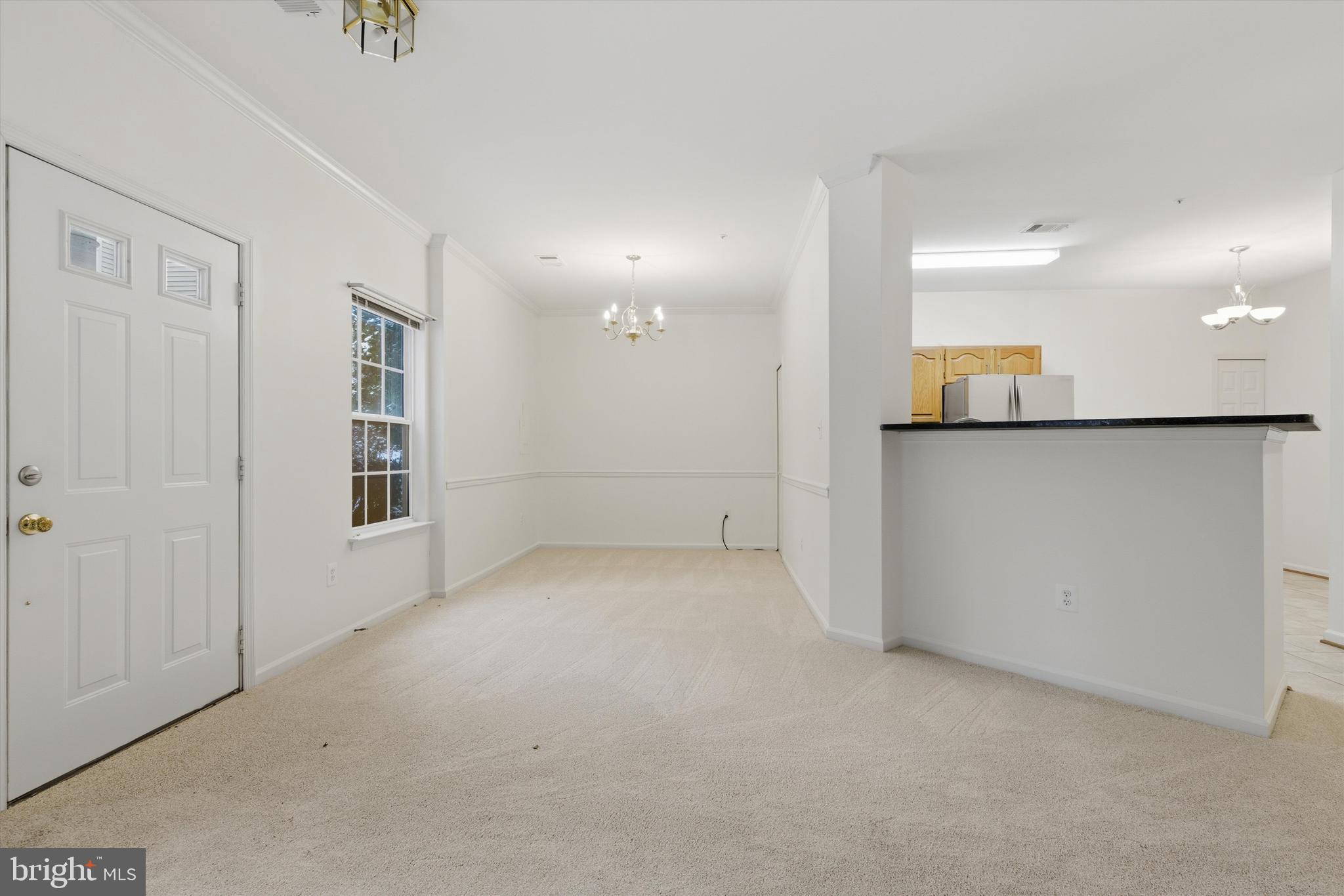 1640 Fallowfield Court, Unit 1640 Crofton, MD 21114 - Photo 10 of 27 an empty room with a empty space and windows