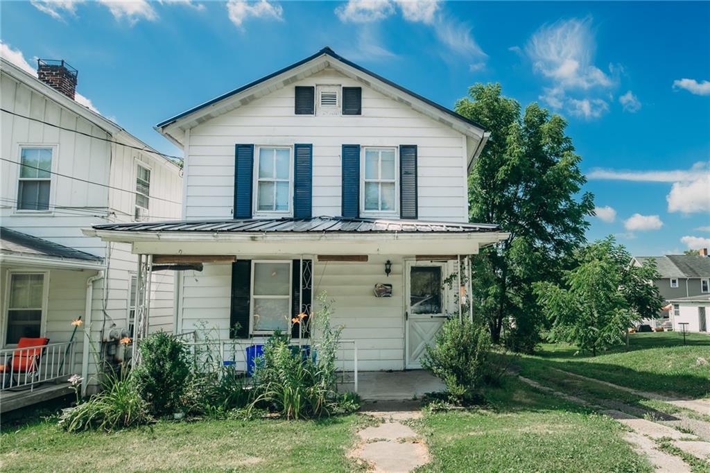 452 Washington Street Indiana, PA 15701 - Photo 1 of 28 a front view of a house with garden
