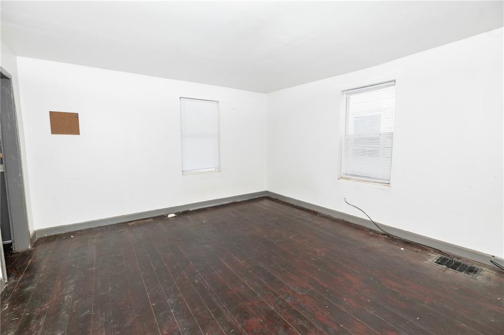 452 Washington Street Indiana, PA 15701 - Photo 22 of 28 an empty room with wooden floor and windows