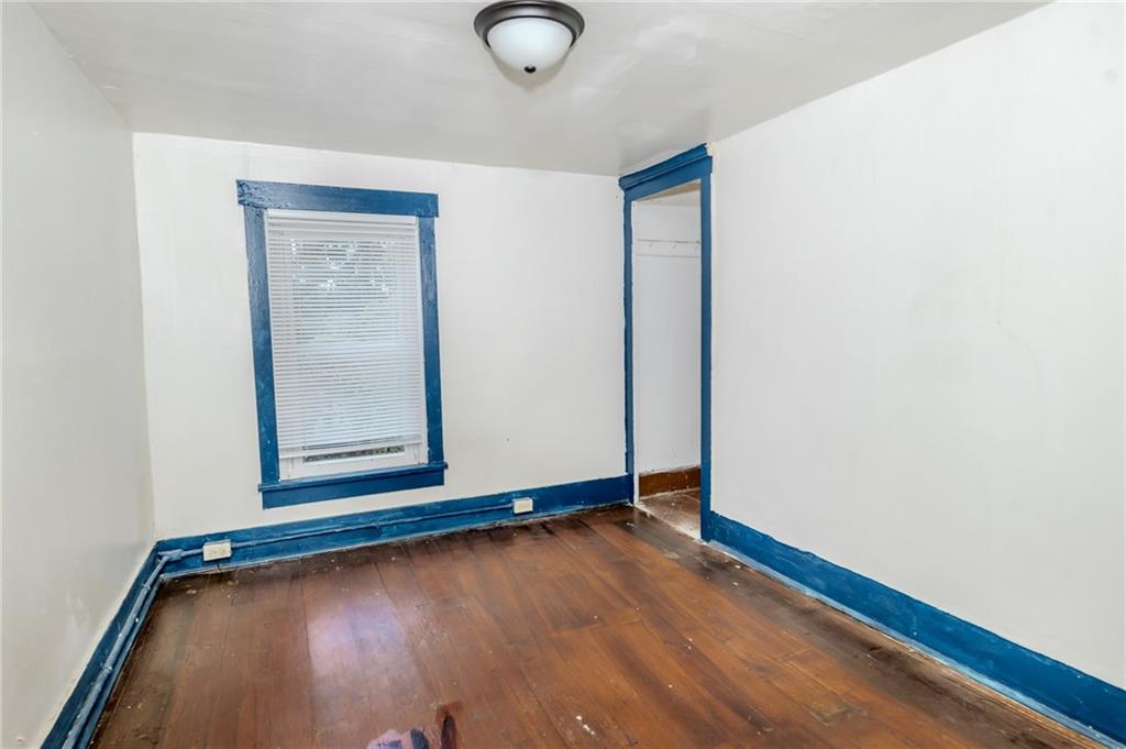 452 Washington Street Indiana, PA 15701 - Photo 25 of 28 a view of an empty room with wooden floor and a window