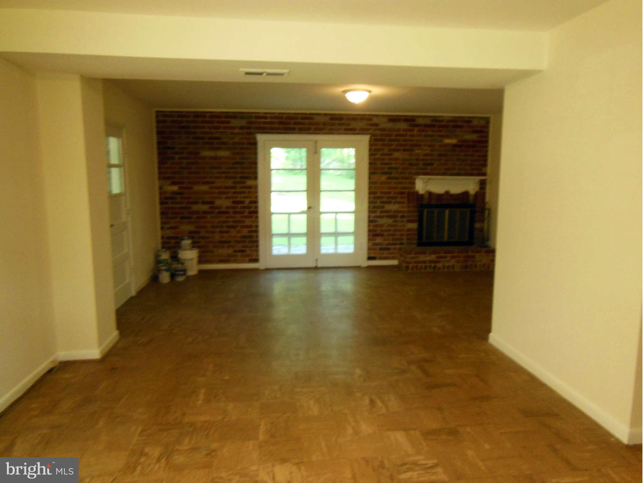 6506 Winnepeg Road Bethesda, MD 20817 - Photo 17 of 30 Family Room with Fireplace