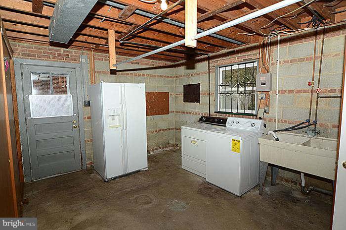 12514 Littleton Street Silver Spring, MD 20906 - Photo 18 of 29 a room with storage and utility