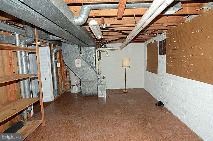12514 Littleton Street Silver Spring, MD 20906 - Photo 22 of 29 a view of an empty room with stairs