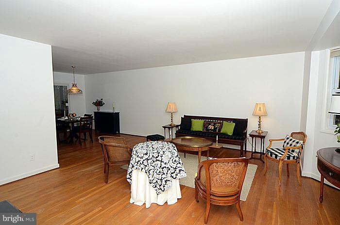 12514 Littleton Street Silver Spring, MD 20906 - Photo 4 of 29 a living room with furniture and a flat screen tv