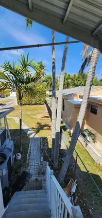 a view of swimming pool with outdoor seating