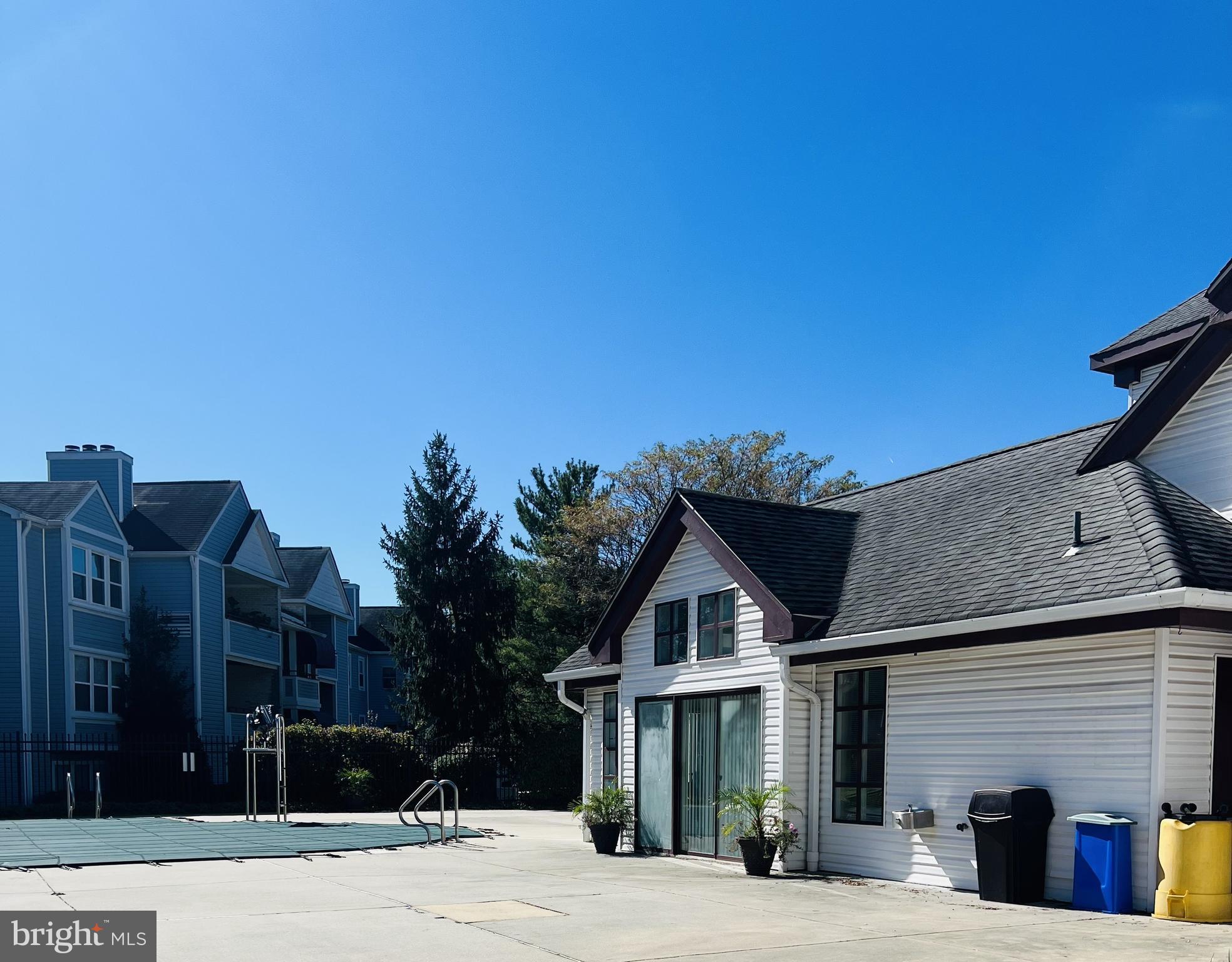 13703 Modrad Way, Unit 9B11 Silver Spring, MD 20904 - Photo 14 of 16 Pool & Clubhouse