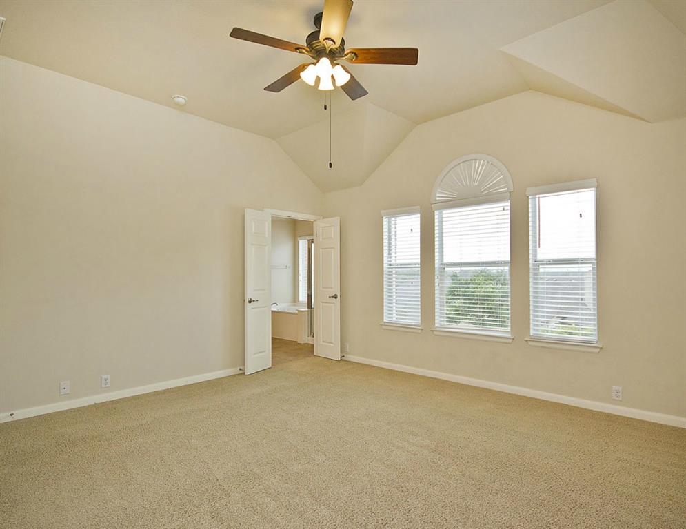 14812 Avery Ranch Boulevard, Unit 16 Austin, TX 78717 - Photo 19 of 32 a view of an empty room with a window