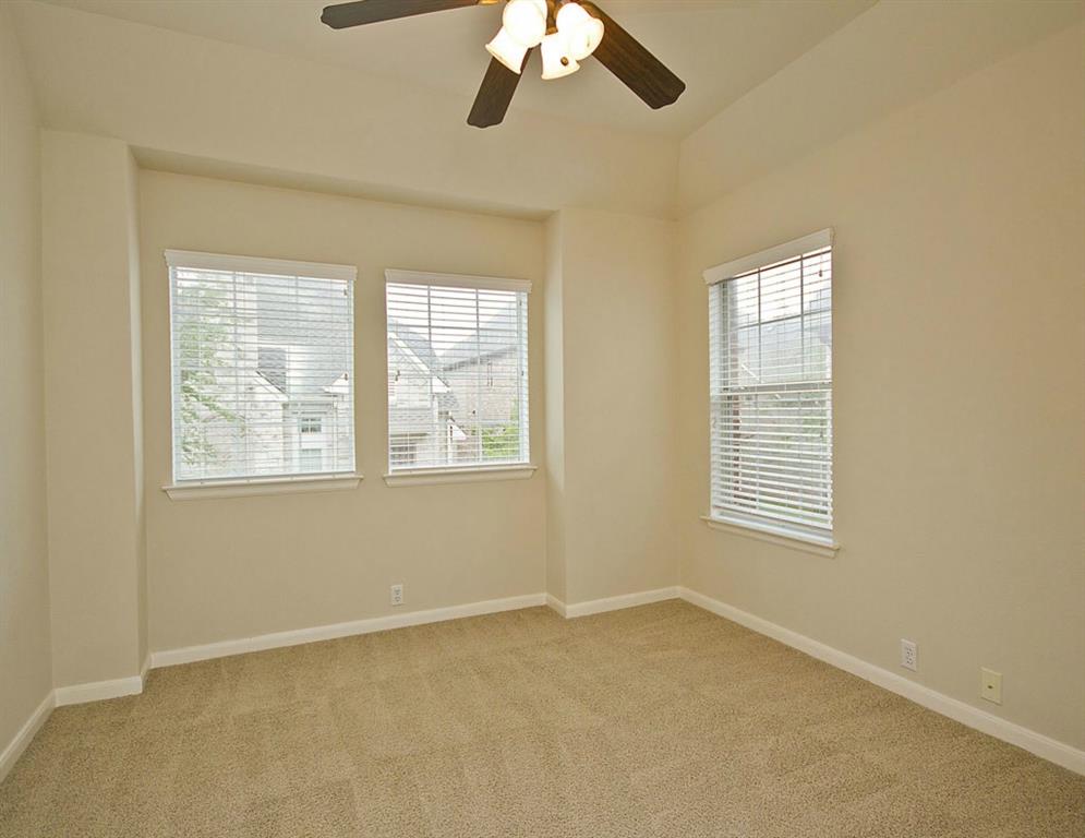14812 Avery Ranch Boulevard, Unit 16 Austin, TX 78717 - Photo 24 of 32 an empty room with a window