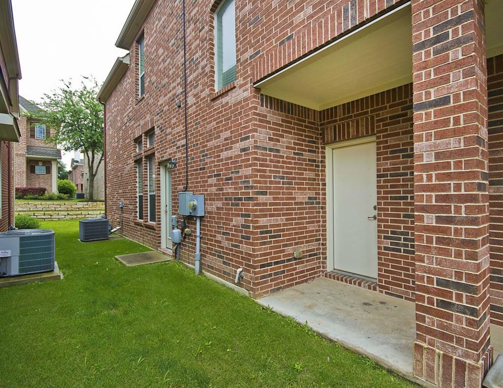 14812 Avery Ranch Boulevard, Unit 16 Austin, TX 78717 - Photo 6 of 32 a view of a backyard with plants