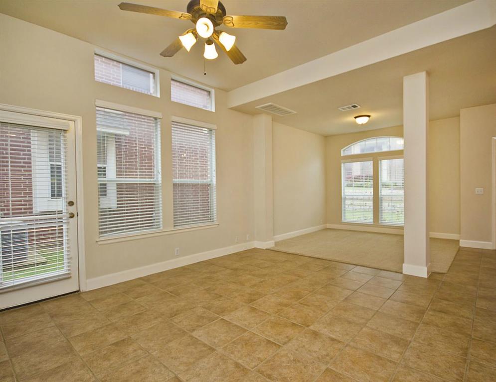 14812 Avery Ranch Boulevard, Unit 16 Austin, TX 78717 - Photo 7 of 32 a view of an empty room with a window