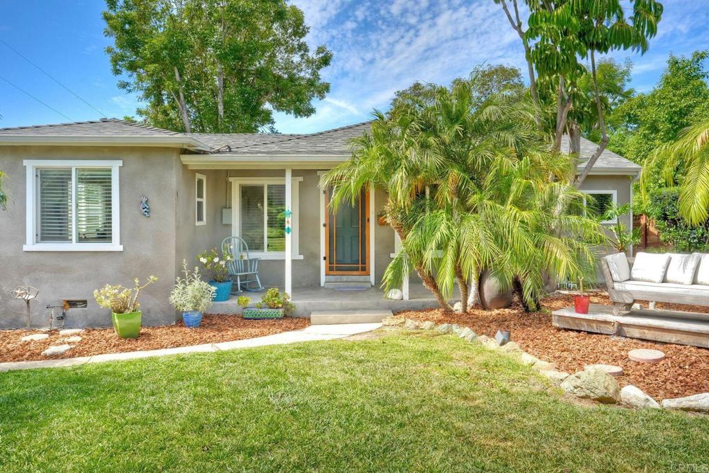 513 Smilax Road Vista, CA 92081 - Photo 1 of 1 a view of a house with backyard and sitting area