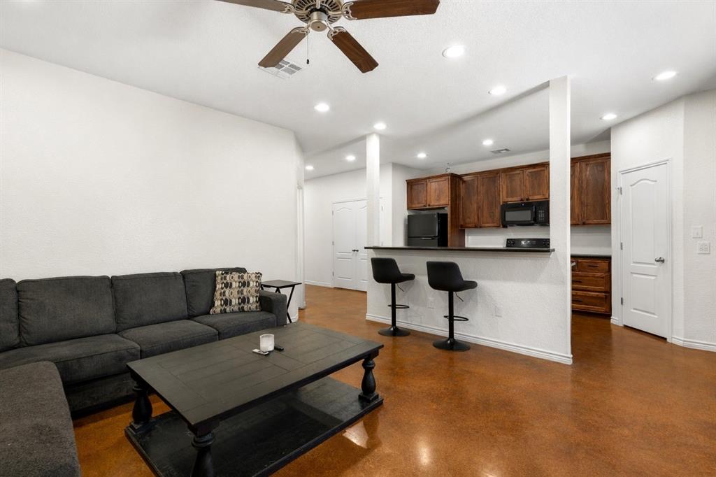 3309 South 3rd Street Waco, TX 76706 - Photo 12 of 31 a living room with furniture and kitchen view