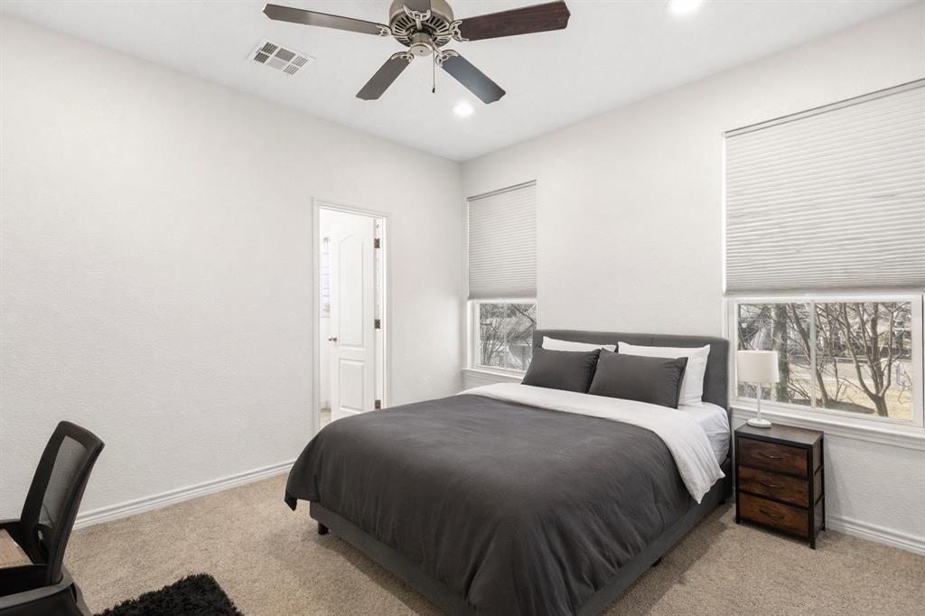 3309 South 3rd Street Waco, TX 76706 - Photo 15 of 31 a bedroom with a bed and a window