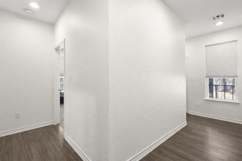 3309 South 3rd Street Waco, TX 76706 - Photo 20 of 31 a view of a room with wooden floor and a window
