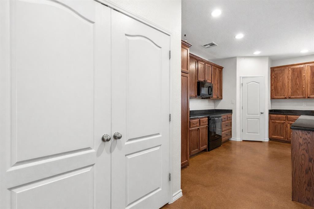 3309 South 3rd Street Waco, TX 76706 - Photo 23 of 31 a view of kitchen with stainless steel appliances cabinets and a counter top space