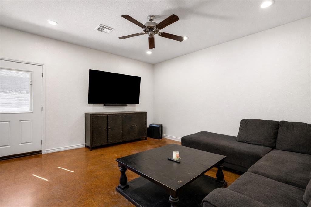 3309 South 3rd Street Waco, TX 76706 - Photo 7 of 31 a living room with furniture and a flat screen tv