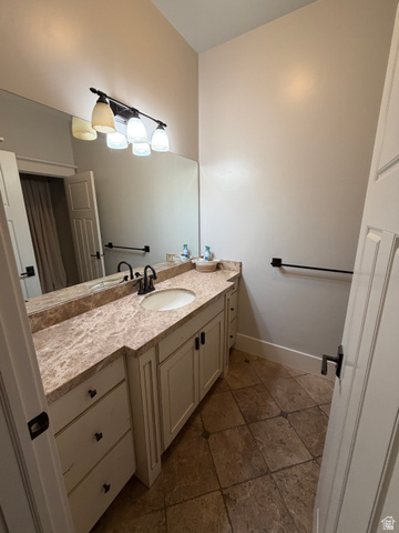 4536 North 475 East Provo, UT 84604 - Photo 22 of 65 Vanity with a built-in sink and a stone-finish countertop