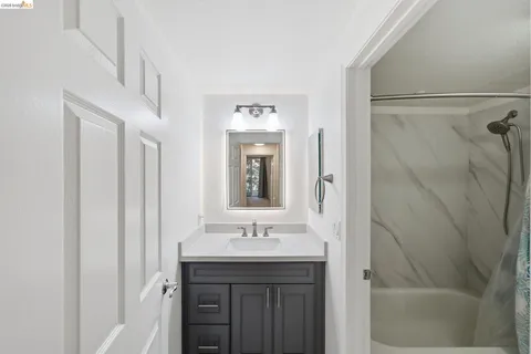 a view of storage and utility room with washer and dryer