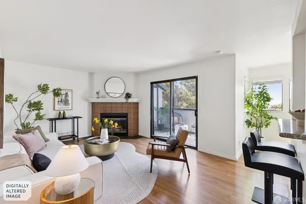 a view of hallway with wooden floor