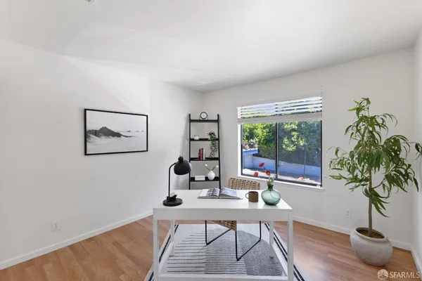 a bathroom with a shower and a sink