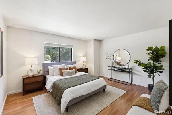 a view of a house with pool and chairs
