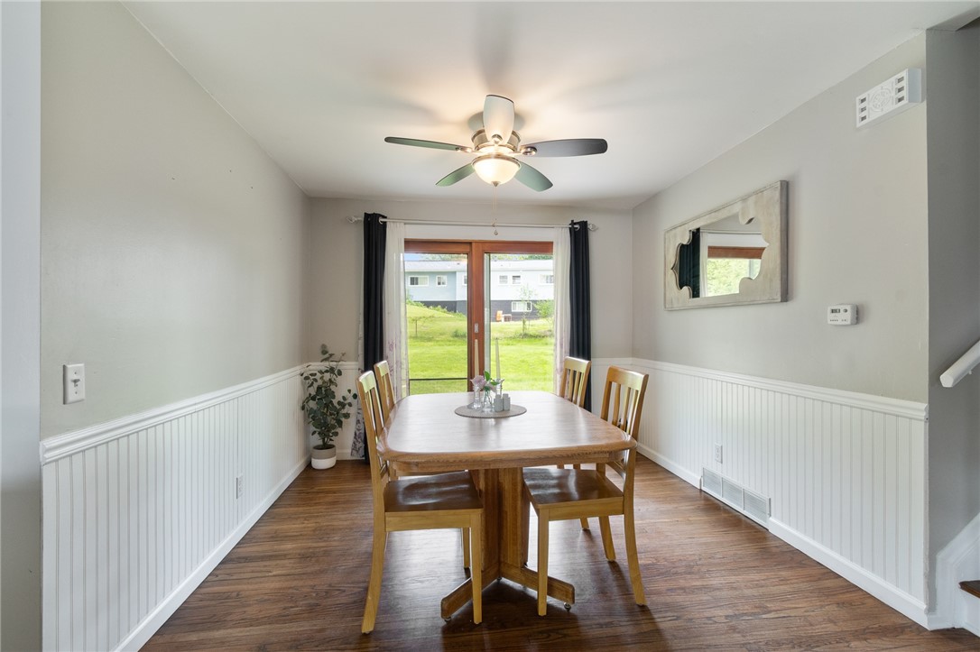 218 Kusak Road Henrietta, NY 14467 - Photo 26 of 33 Dining room with sliders to backyard.
