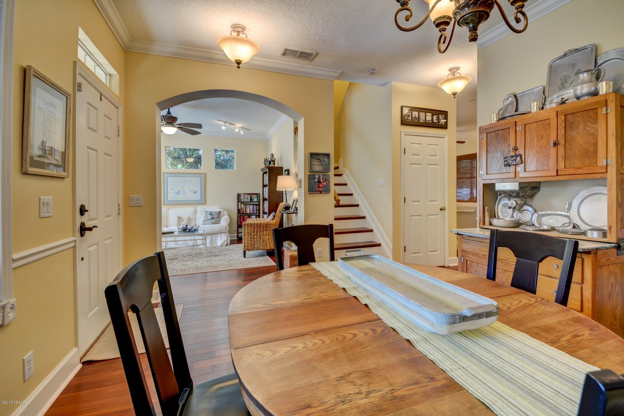 409 Manor View Lane DeLand, FL 32724 - Photo 11 of 31 a living room with furniture and a wooden floor