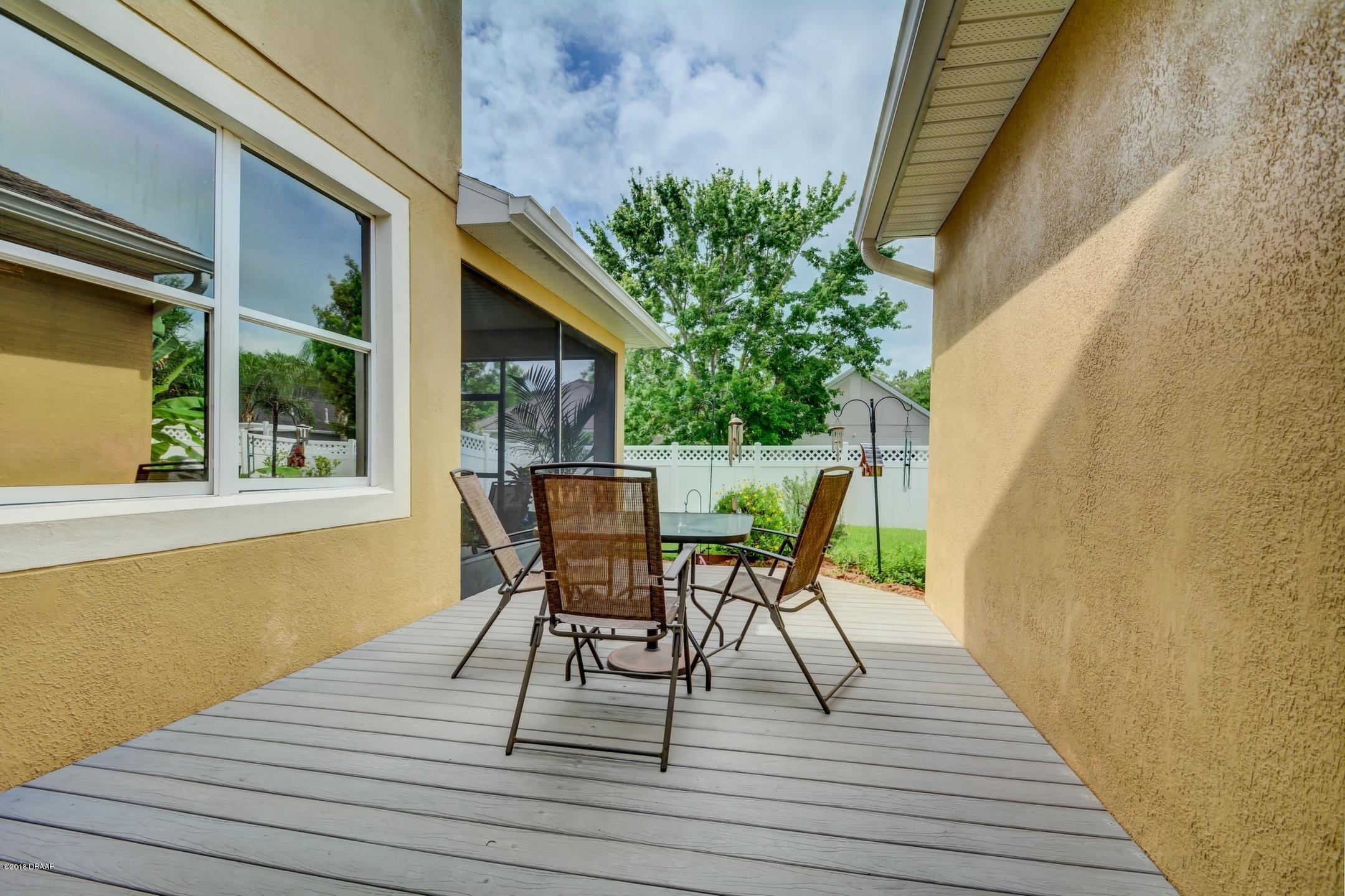 409 Manor View Lane DeLand, FL 32724 - Photo 27 of 31 a deck view with a seating space