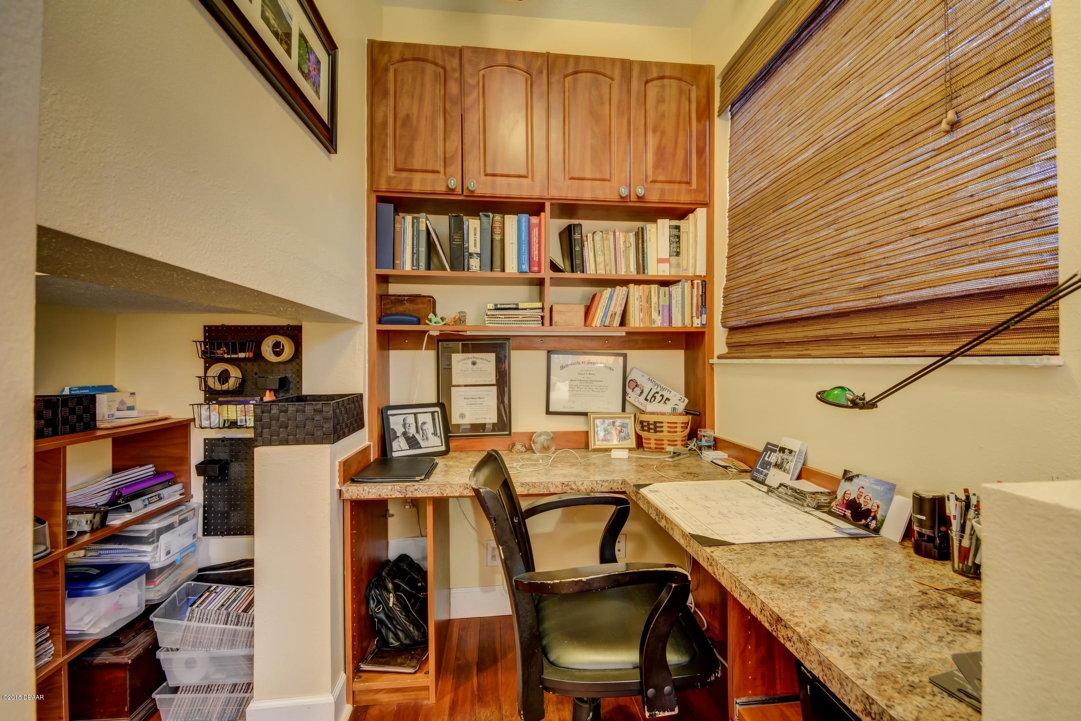 409 Manor View Lane DeLand, FL 32724 - Photo 10 of 31 a view of a workspace with furniture