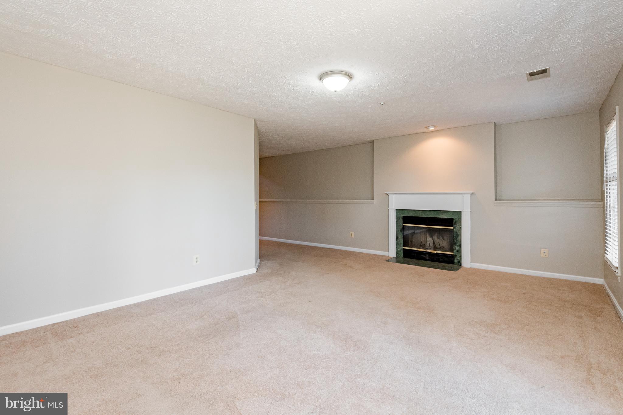 2115 Colonel Way Odenton, MD 21113 - Photo 19 of 63 Wood burning fireplace in family room